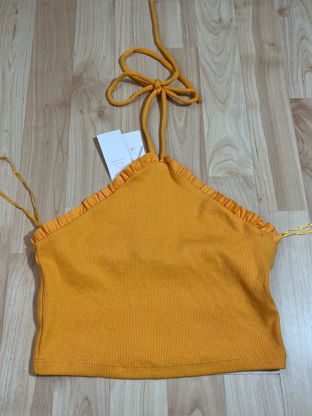 Zara ribbed ruffle halter top features a vibrant yellow color small NWT